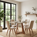 Dining room with a wooden table and chairs, plants, and large windows.