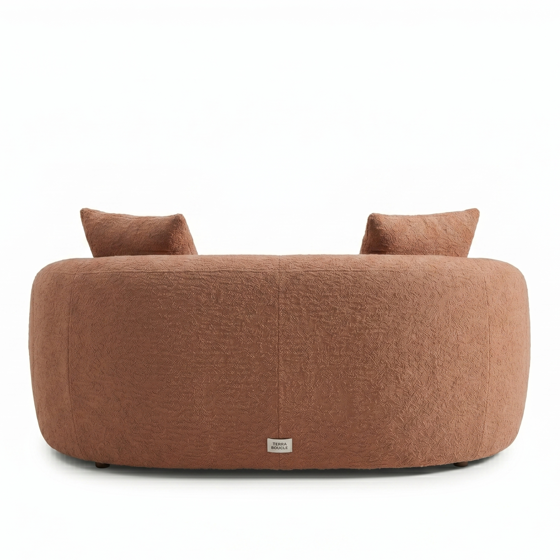 Brown sofa with two cushions on a white background