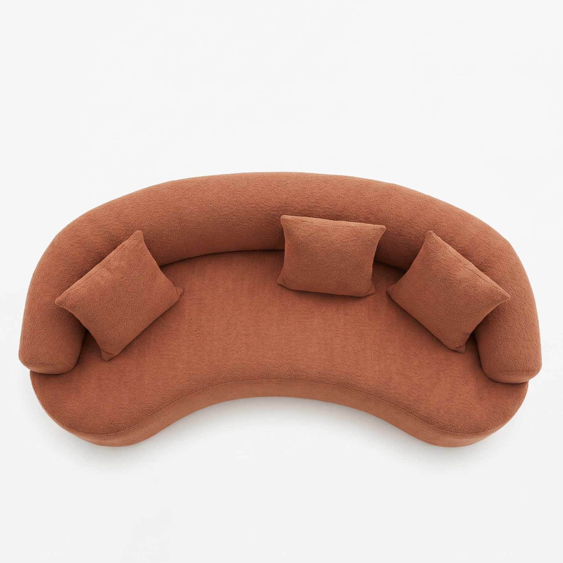 Brown curved sofa with three cushions on a white background